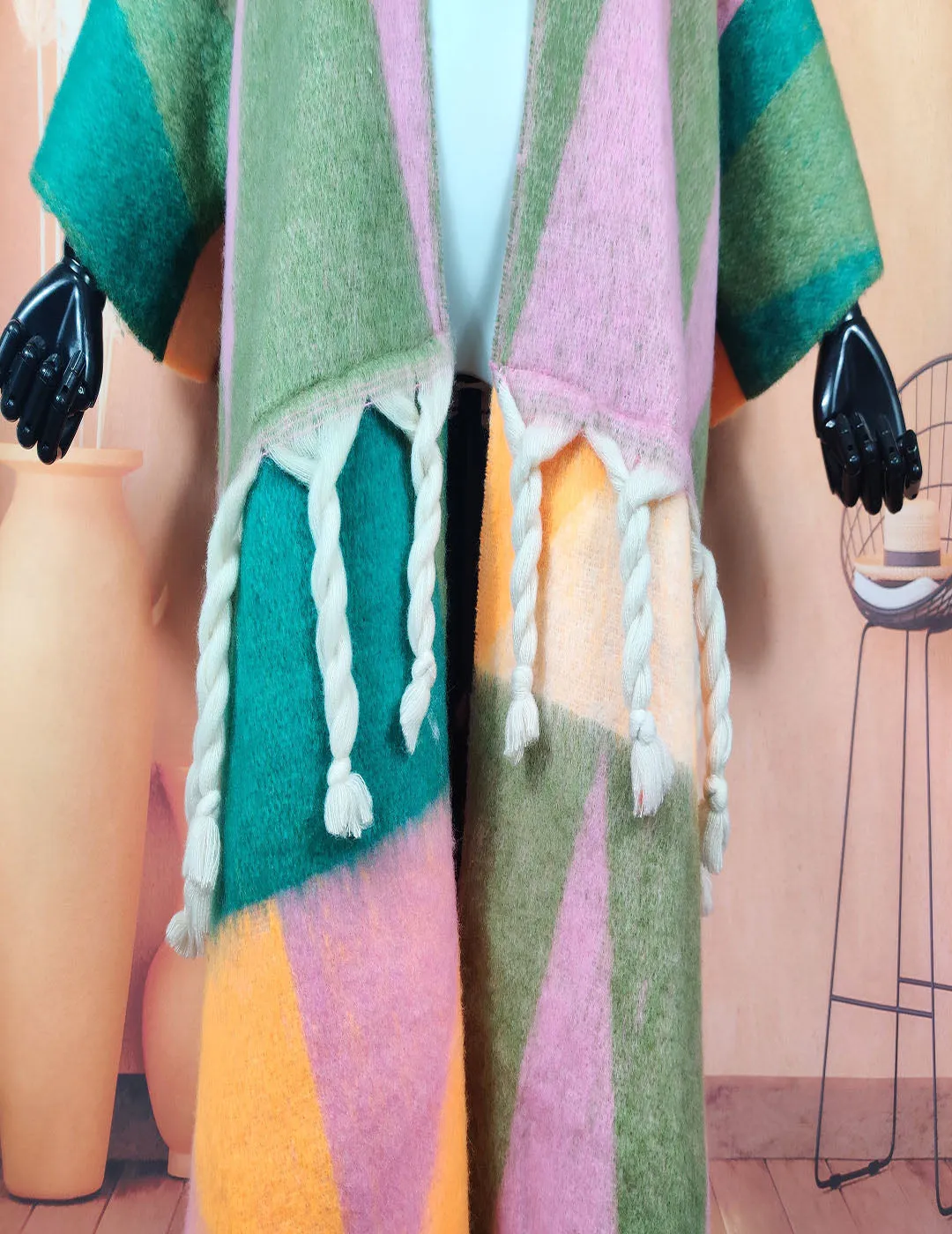 Warm, fuzzy long cardigans open in the front. Oversized African multicolored soft woolen coat